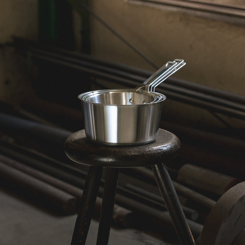 Set of 3 stainless steel saucepans with glass lids